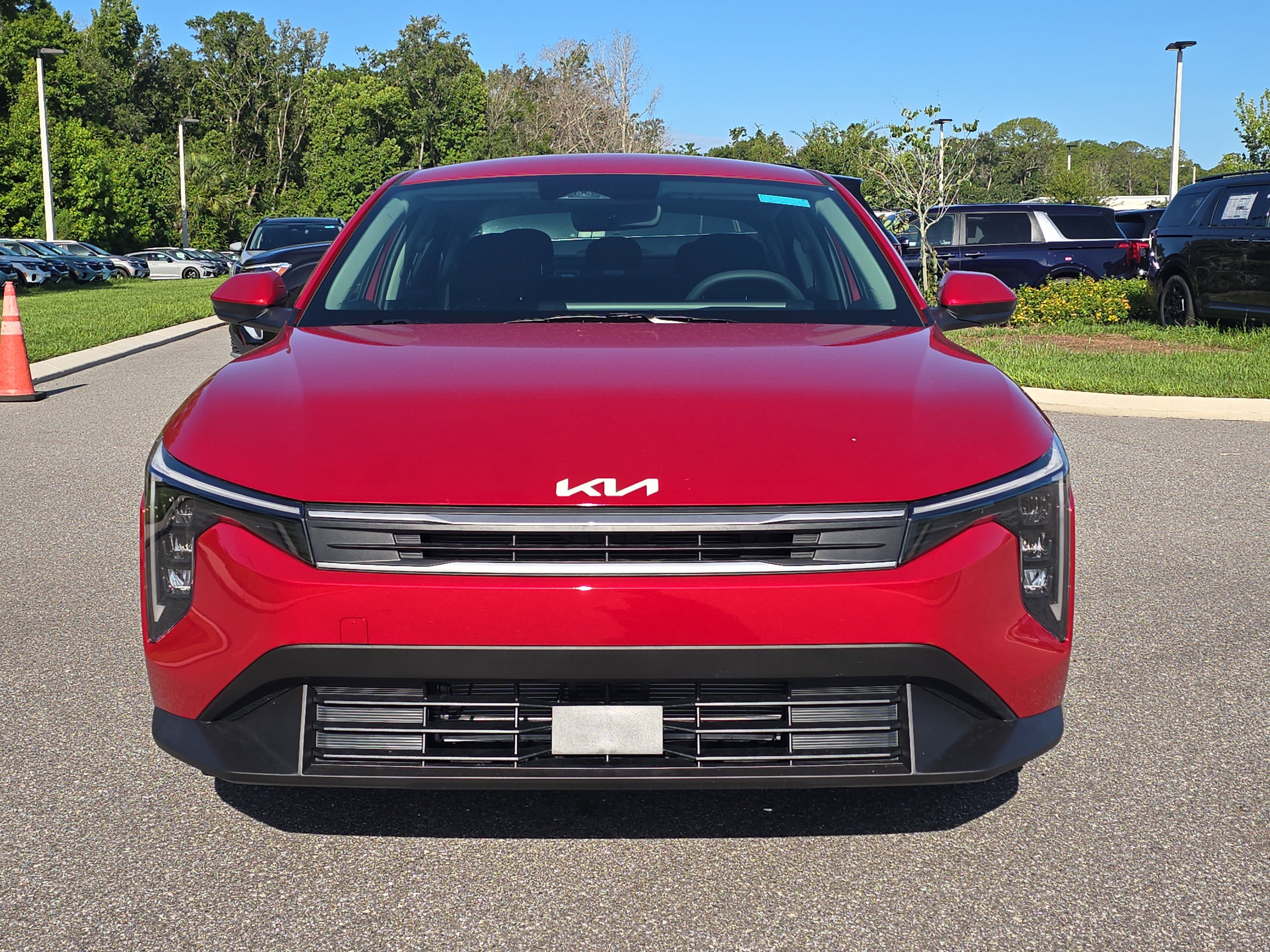 New 2026 Currant Red Kia LXS image 3