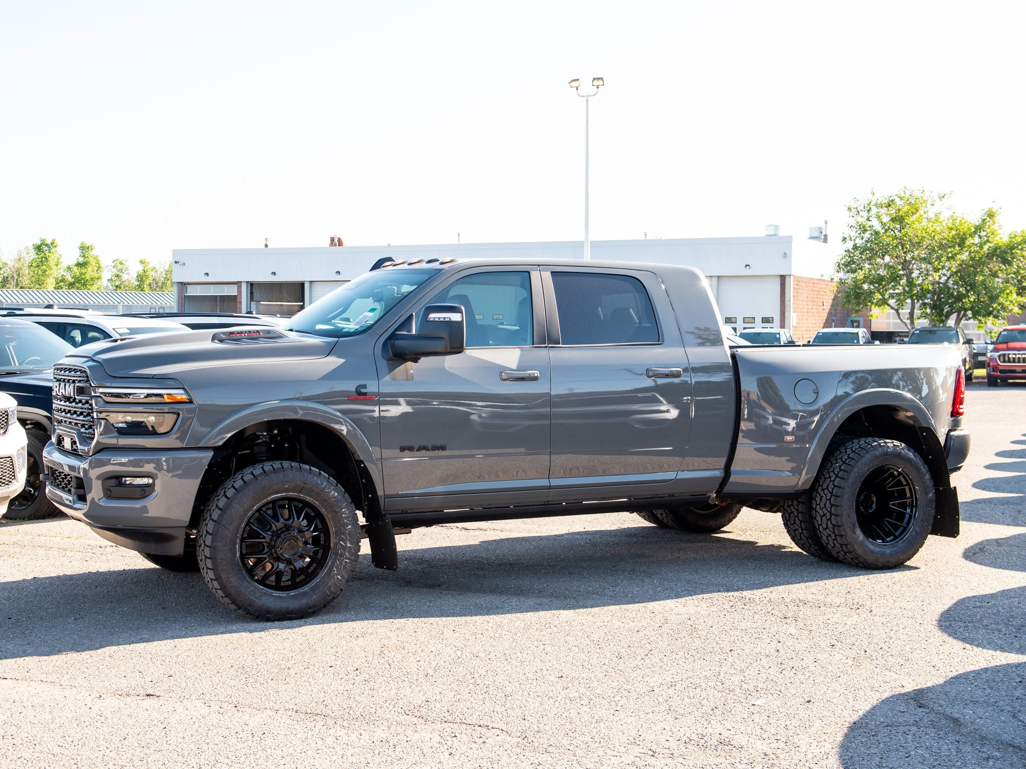 Used 2026 Grey RAM Limited* Mega Cab, 2 Inch Lift, 35 Inch Toyos, Trigger Industries Mudflaps image 7