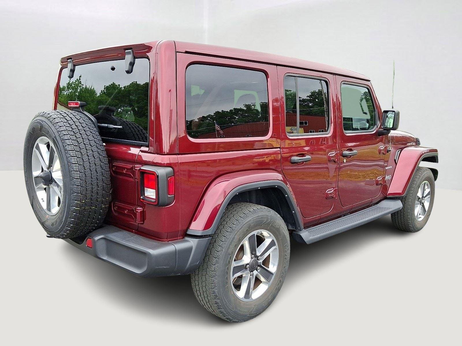 Used 2021 Snazzberry Pearlcoat Jeep Unlimited Sahara image 7