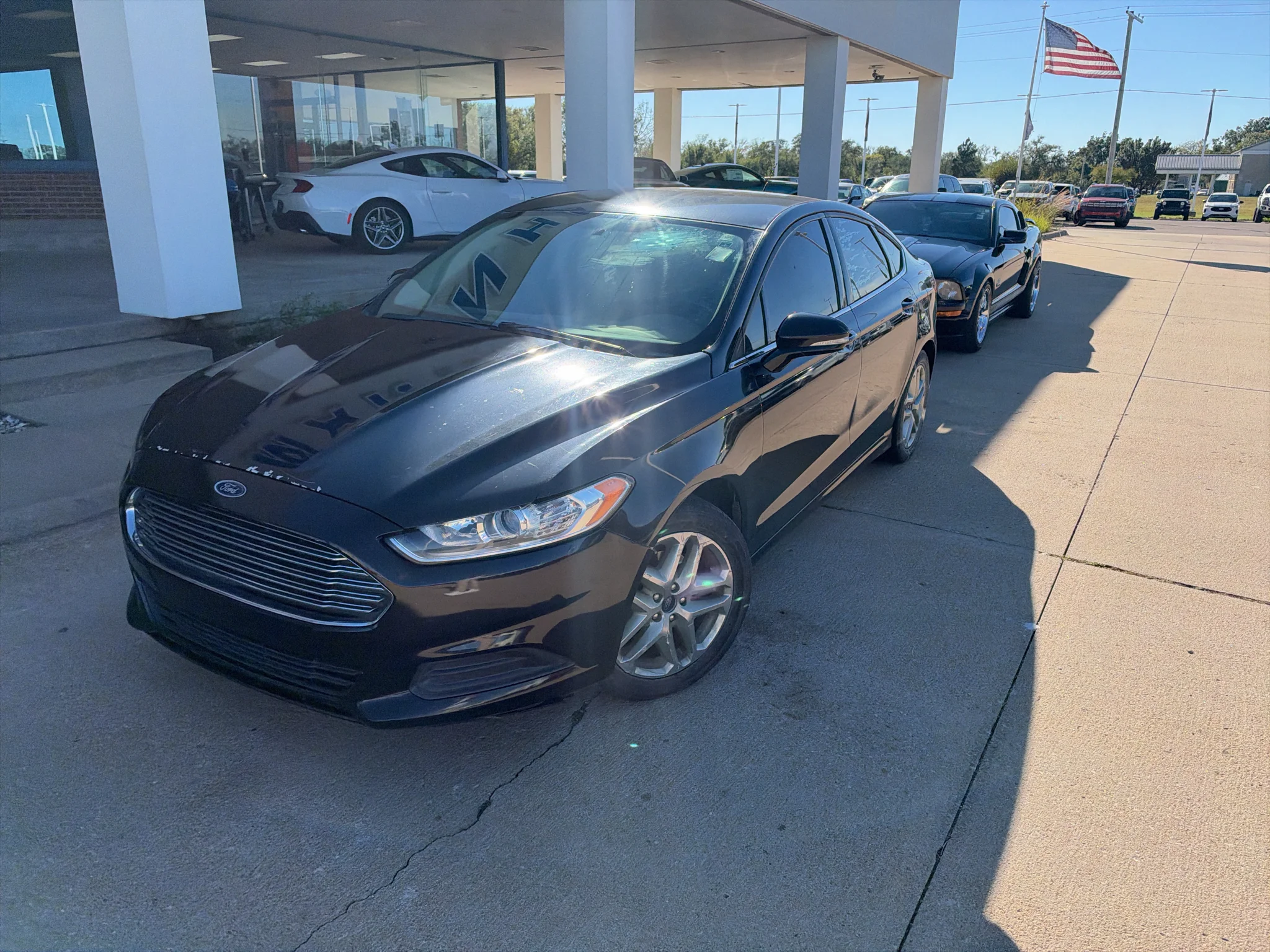 Used 2015 Ruby Red Tinted Clearcoat Ford SE image 2