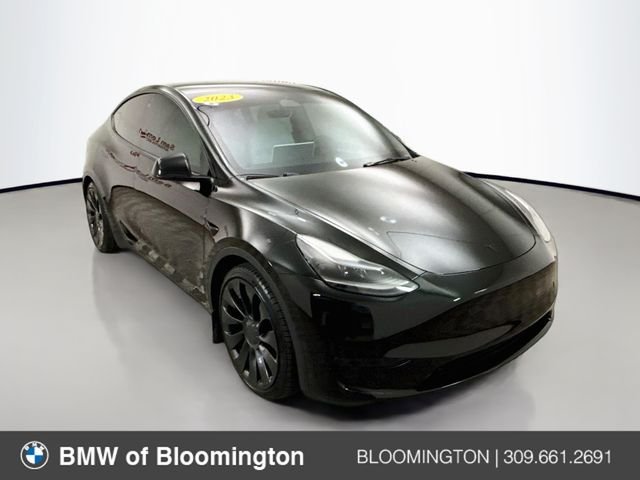 Used 2023 Solid Black Tesla Performance image 1