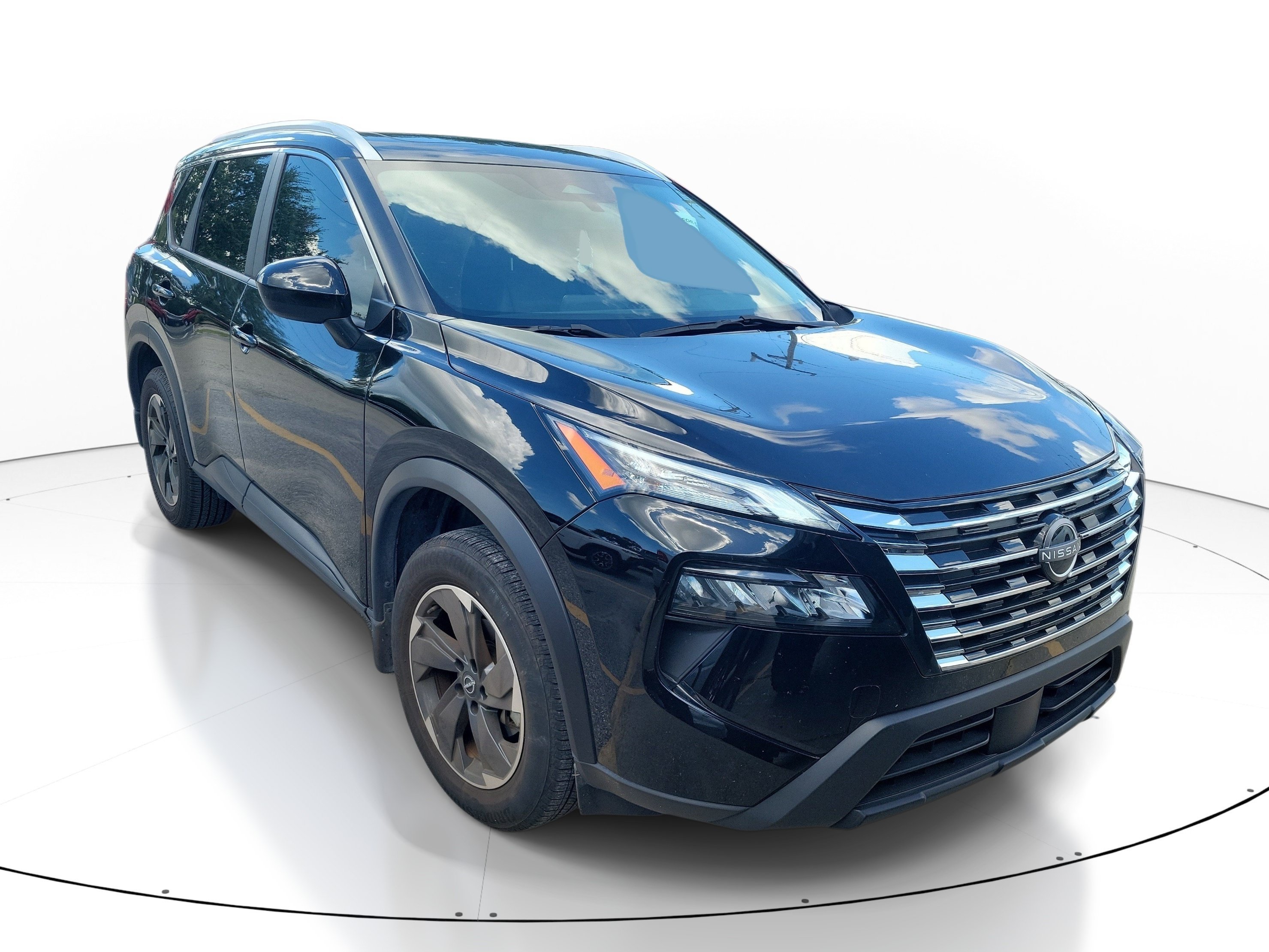 Used 2024 Super Black Nissan SV image 1