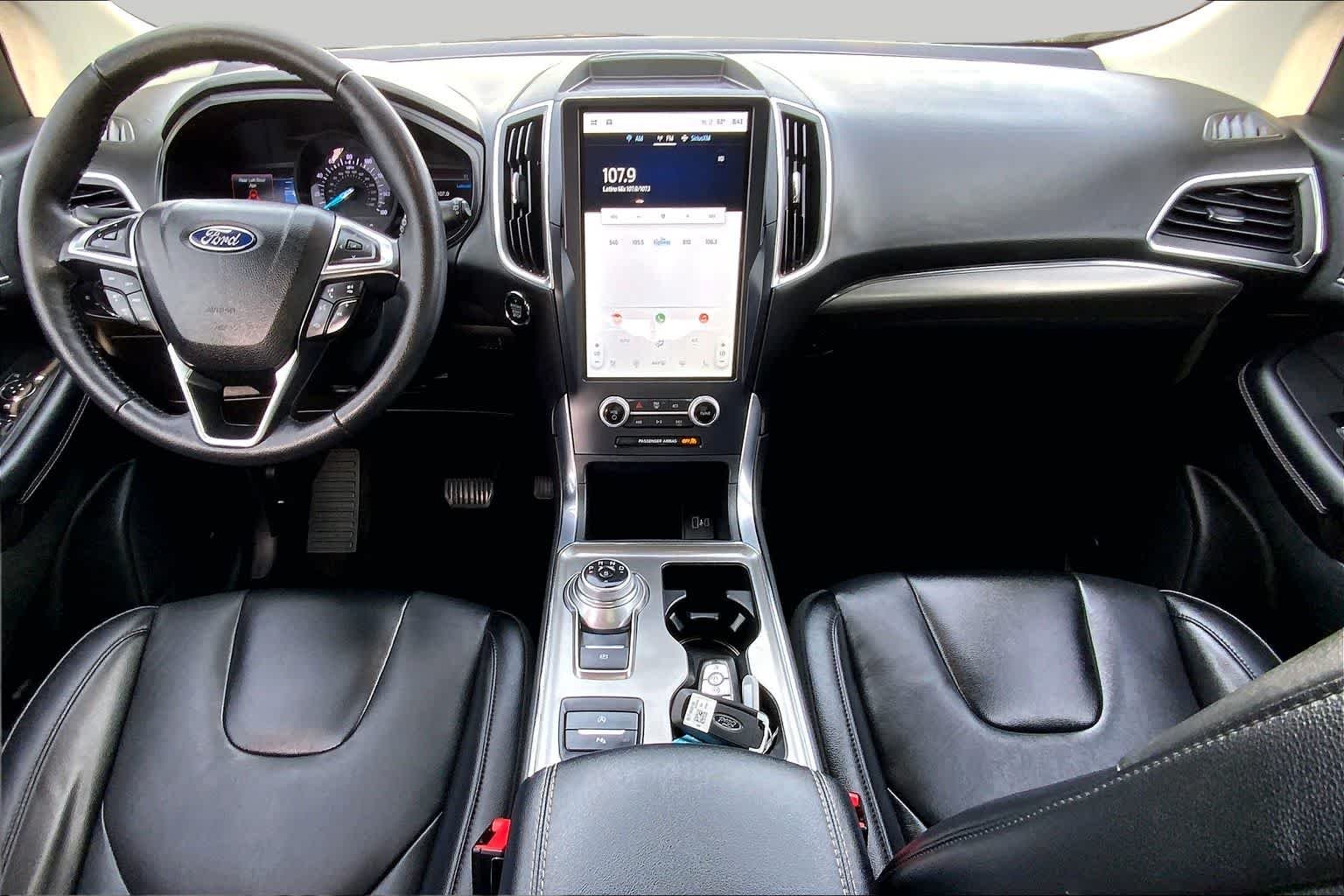 Used 2022 Agate Black Metallic Ford Titanium image 14