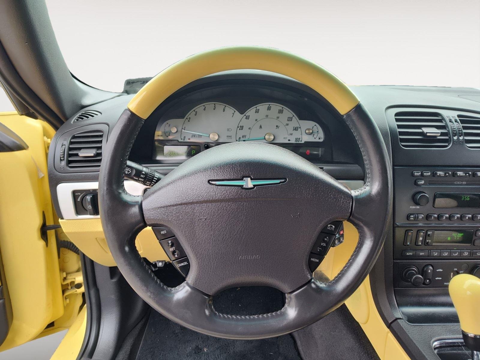 Used 2002 Inspiration Yellow Ford Deluxe image 12