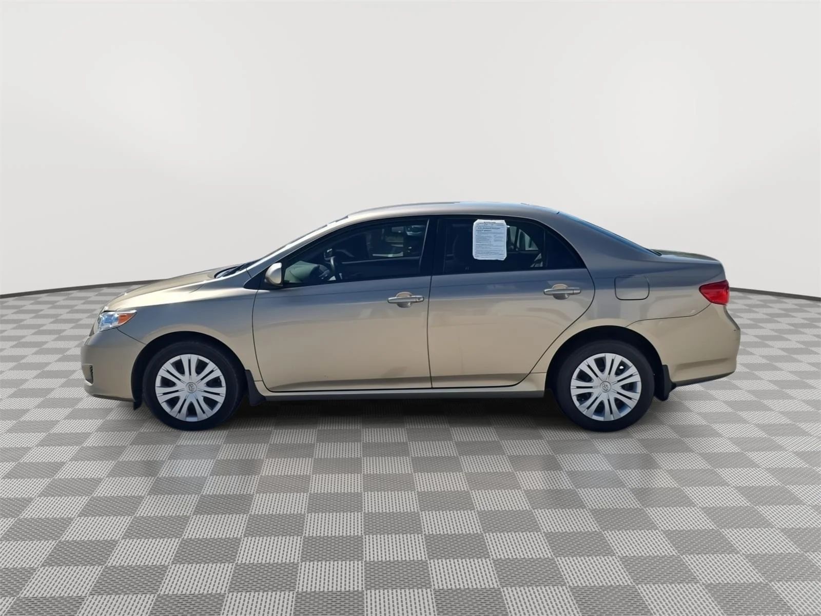 Used 2009 BROWN Toyota 4dr Sdn Man (Natl) image 6