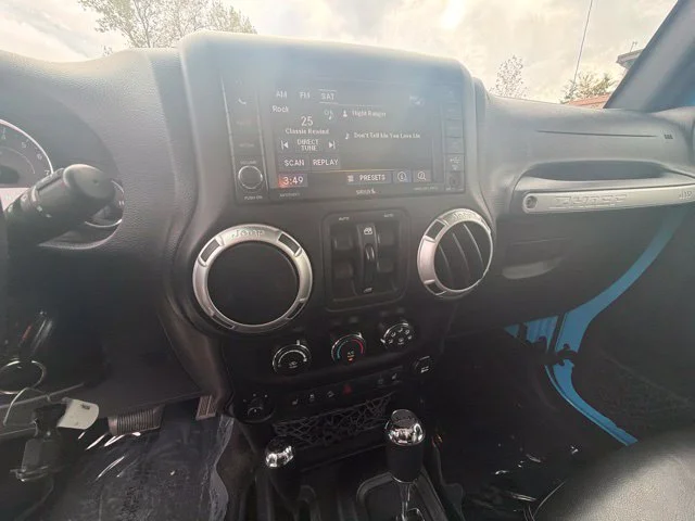 Used 2017 Blue Jeep Unlimited Sahara image 21