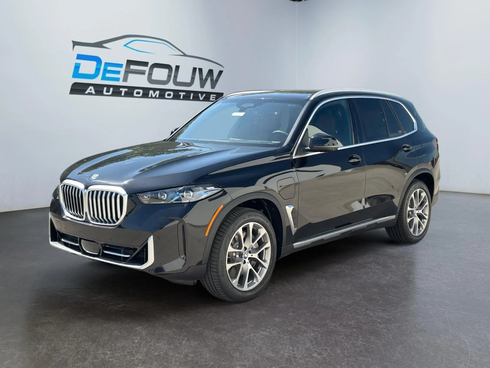 New 2026 Black Sapphire Metallic BMW xDrive50e image 7