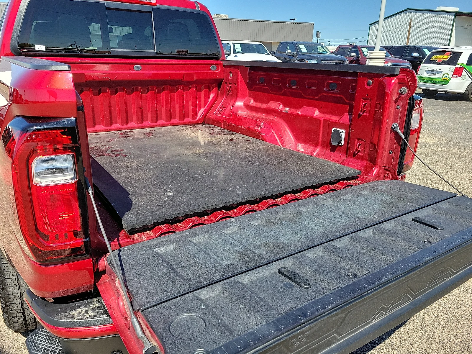 Certified Used 2024 Volcanic Red GMC 4WD AT4 image 15