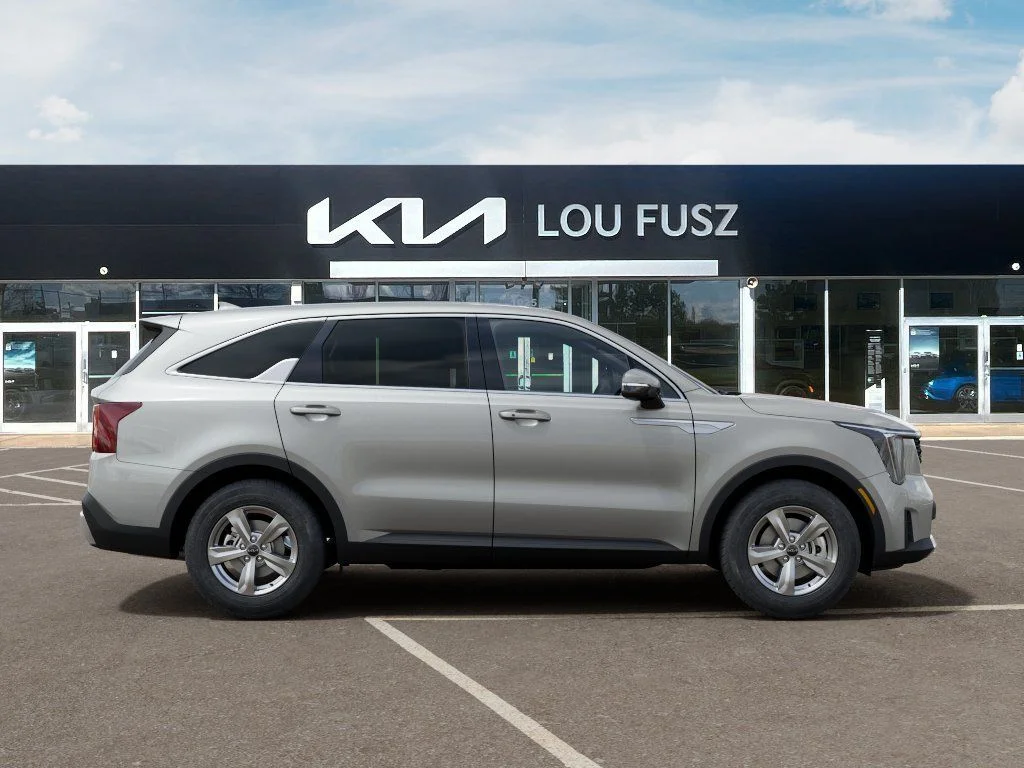 New 2026 Ivory Silver Kia LX image 7