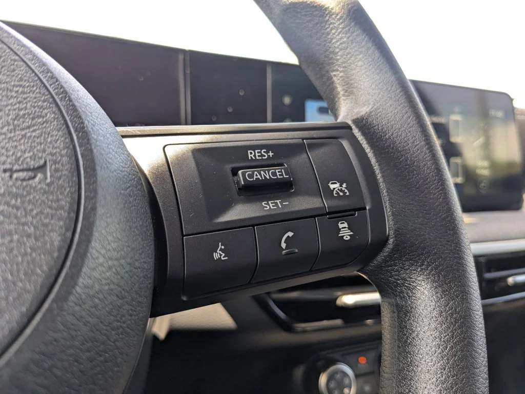 Used 2025 Canyon Bronze Metallic Nissan SV image 23