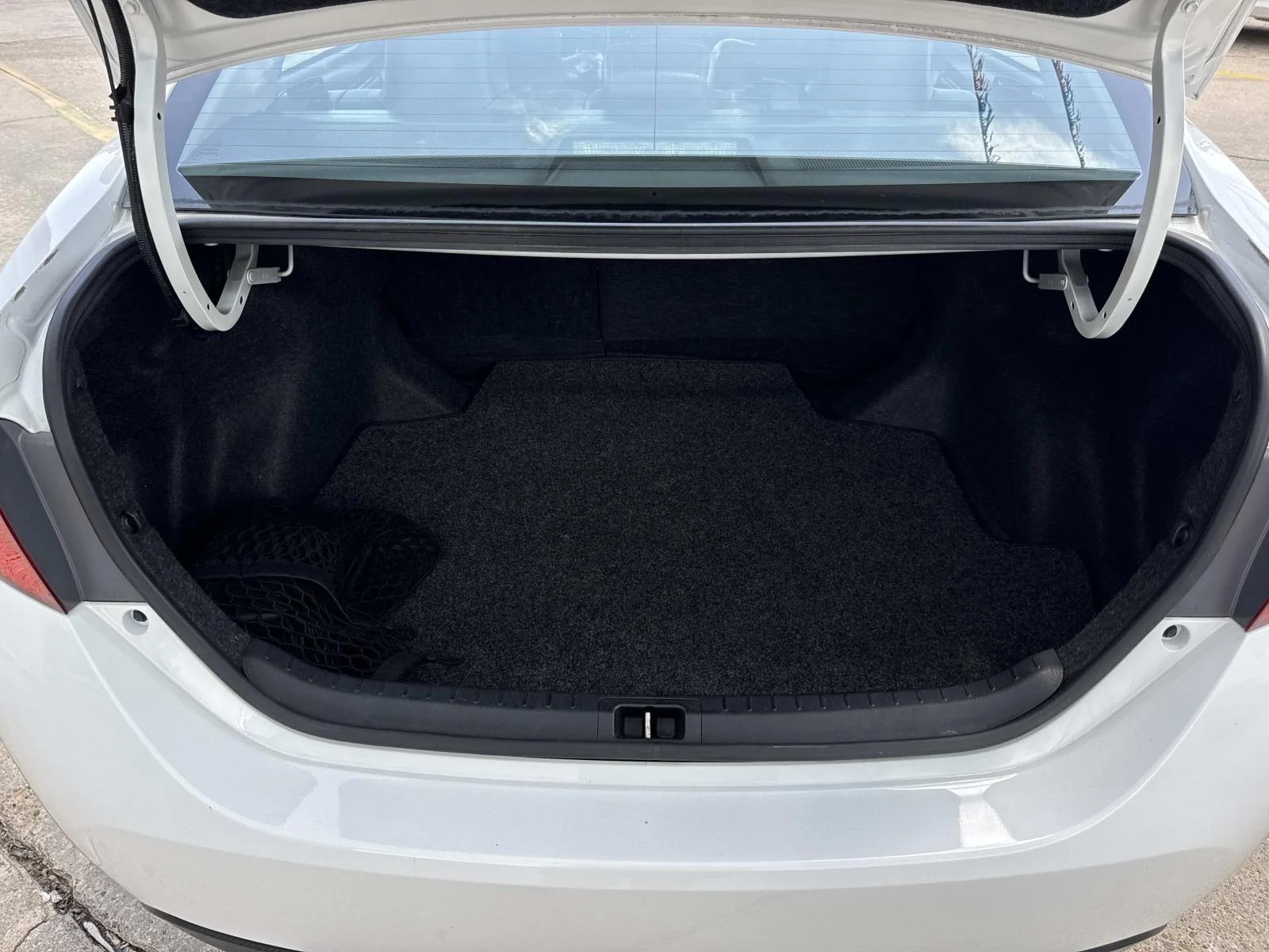 Used 2019 Super White Toyota LE image 8