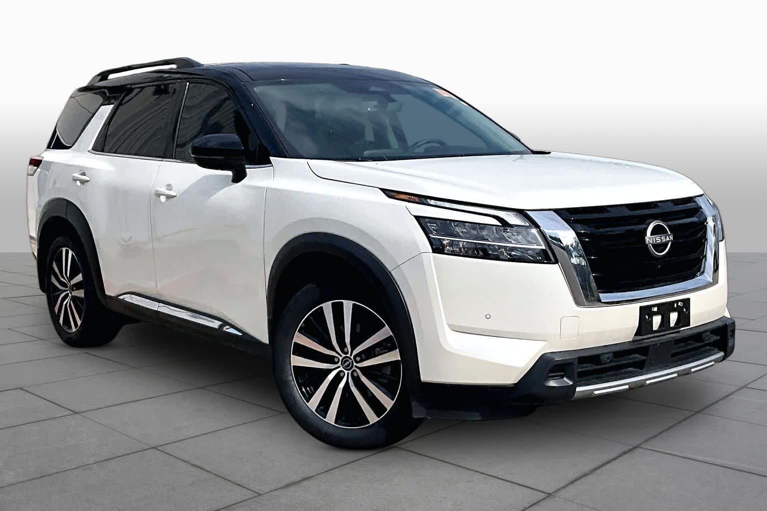Used 2024 Pearl White Tricoat/Super Black Nissan Platinum image 3