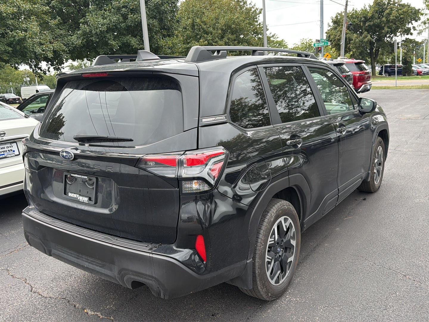 Used 2025 Crystal Black Silica Subaru Premium image 4