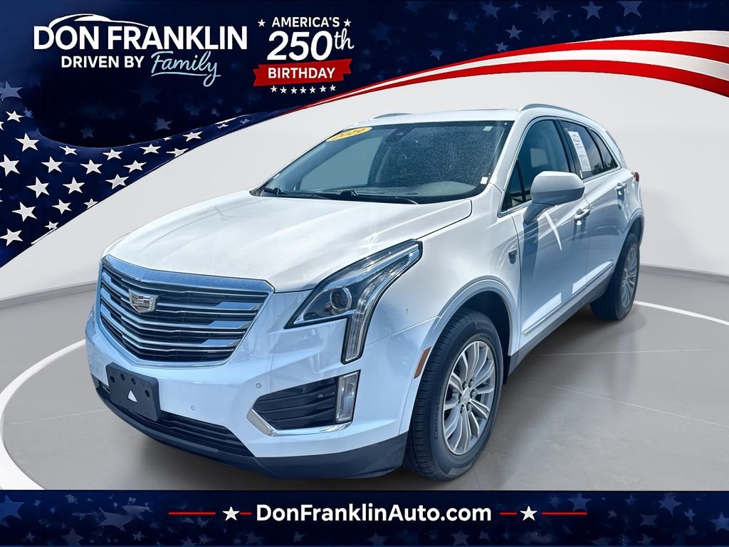 Used 2019 White Cadillac Luxury image 1