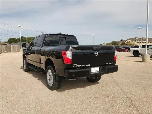 Used 2024 Black Nissan SV (A9) 4x4 Crew Cab 6.5 ft. box 151.6 in. WB image 2