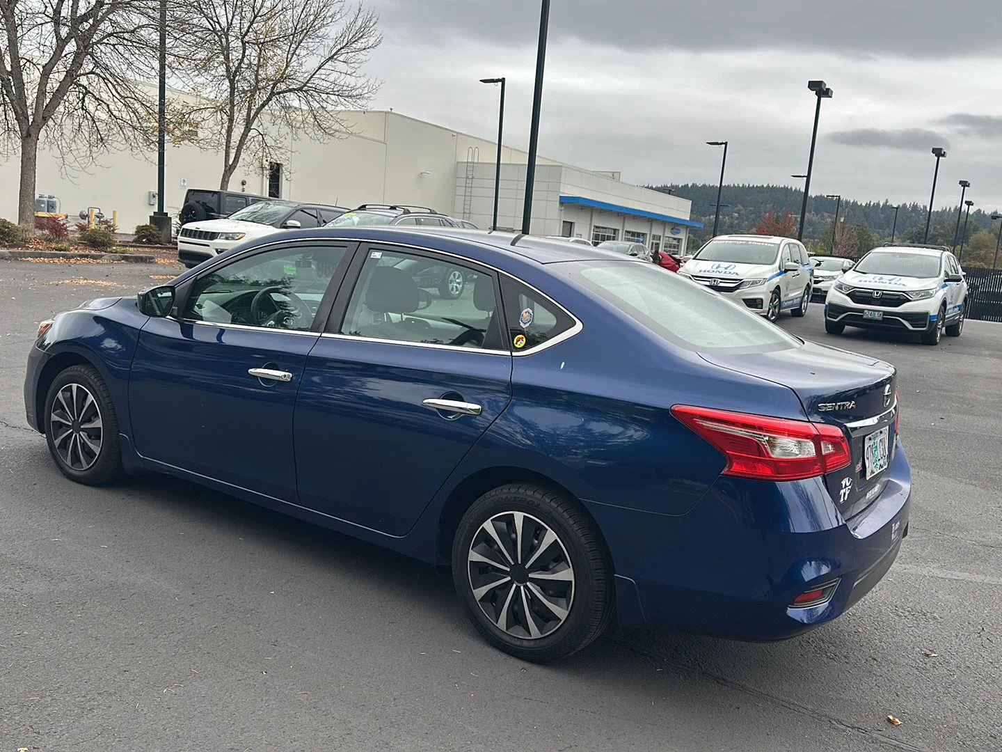 Used 2019 Deep Blue Pearl Nissan S image 2