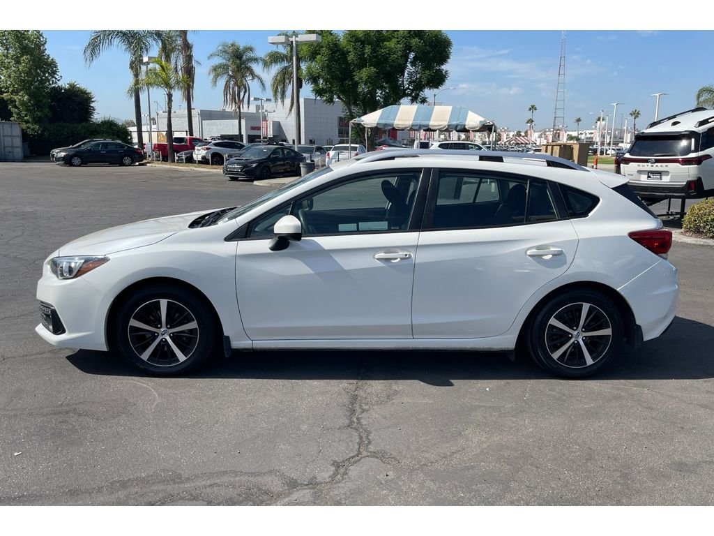 Used 2023 CRYSTAL WHITE PEA Subaru Premium image 2