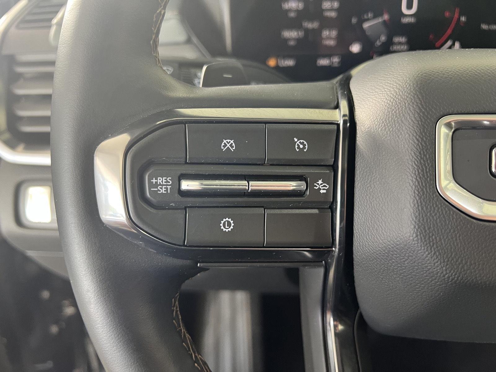Used 2026 Ebony Twilight Metallic GMC AWD AT4 image 25