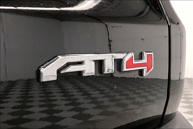 Used 2025 Ebony Twilight Metallic GMC AT4 image 9