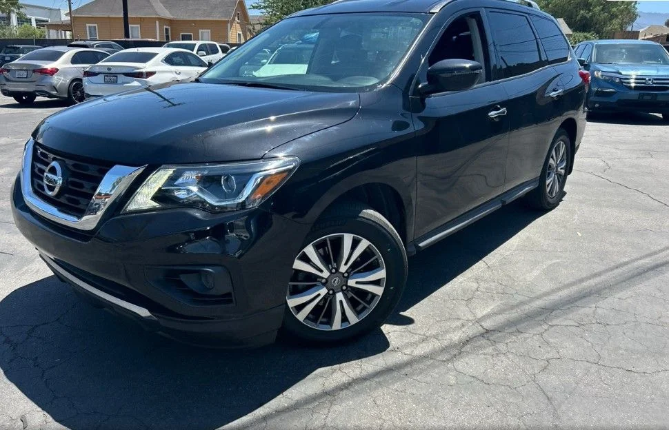 Certified Used 2018 Black Nissan S image 1