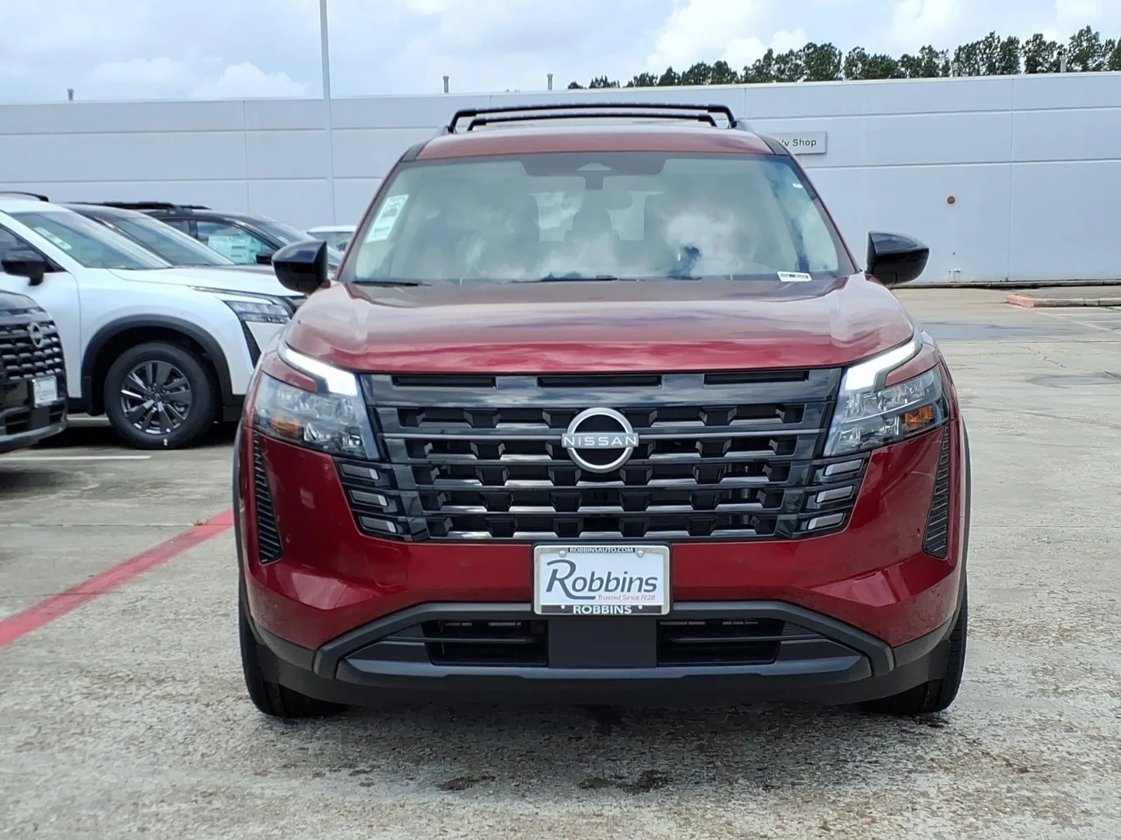 2026 Nissan Pathfinder SV Red at Robbins Nissan