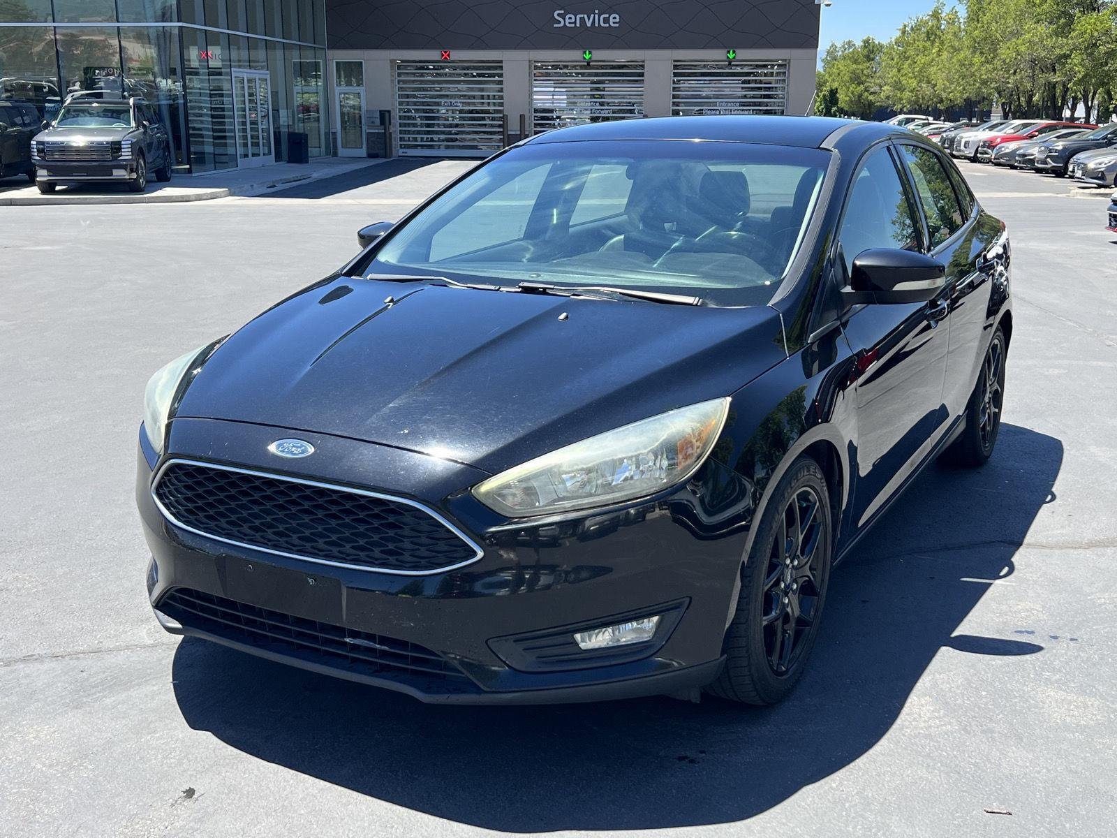 Used 2016 Ford Focus SE with VIN 1FADP3F2XGL336972 for sale in Lindon, UT
