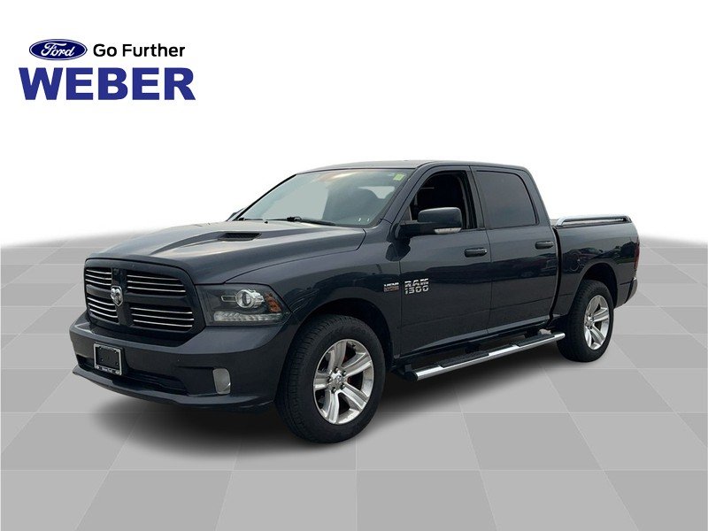 Used 2016 Granite Crystal Metallic Clearcoat Ram 4WD Crew Cab 140.5" Sport image 1