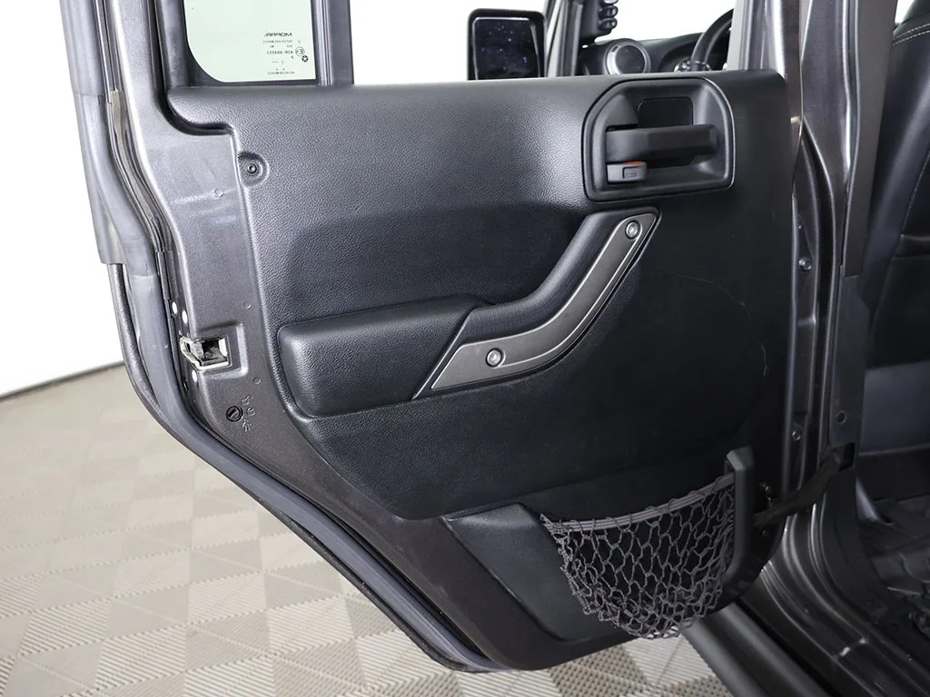Used 2018 Granite Crystal Metallic Clearcoat Jeep Unlimited Sport image 18