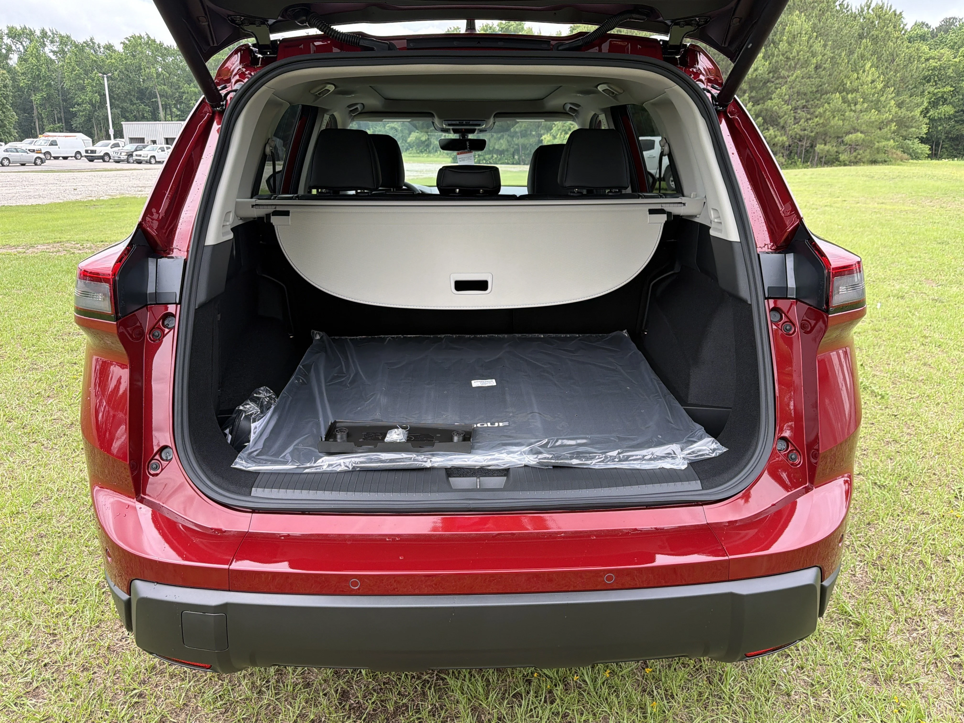 New 2026 Scarlet Ember Tintcoat Nissan Dark Armor image 27