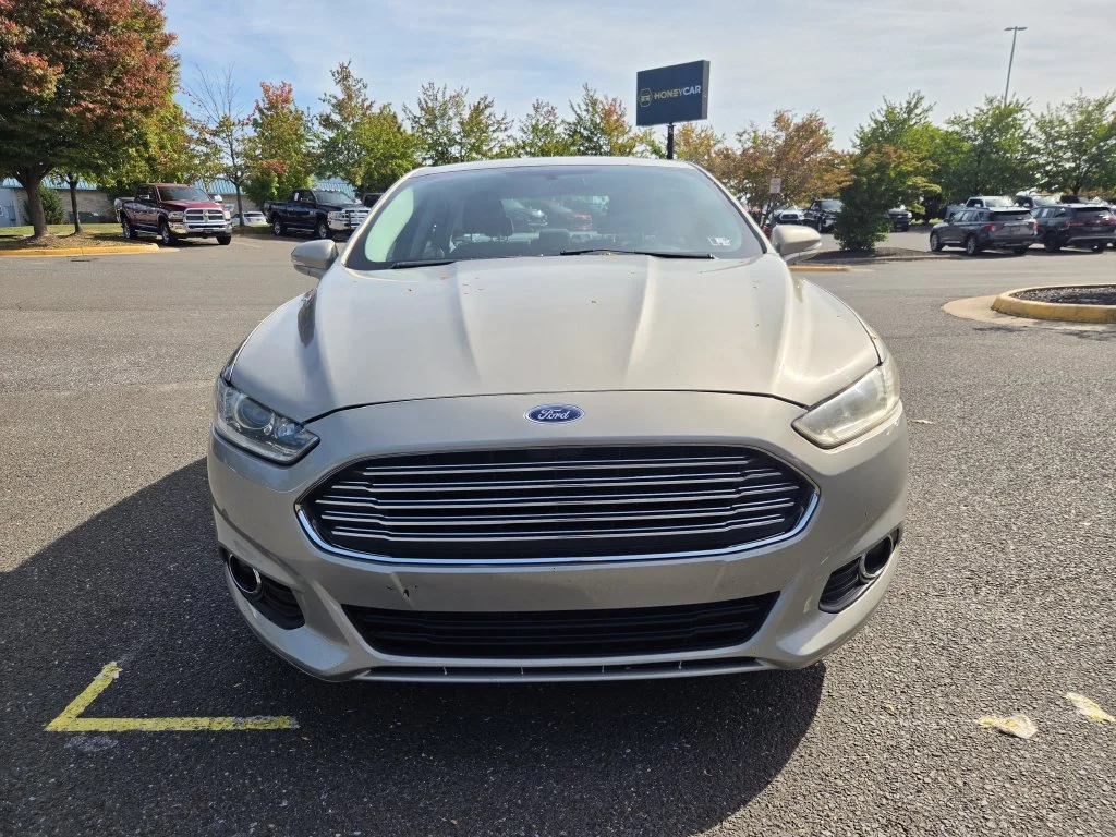 Used 2015 Gold Ford SE image 2