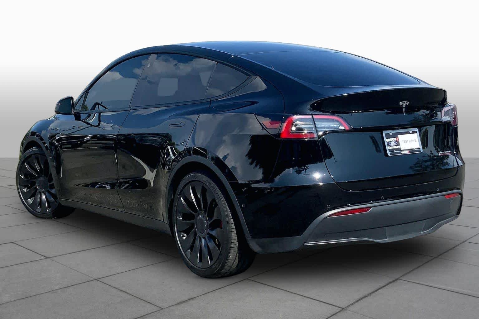 Used 2021 Solid Black Tesla Performance image 11