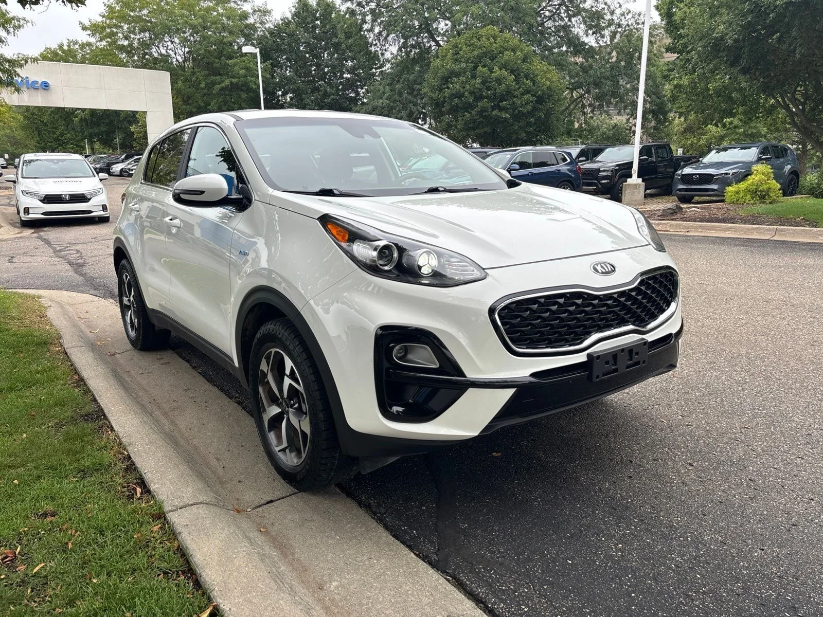 Used 2021 Clear White Kia LX image 11