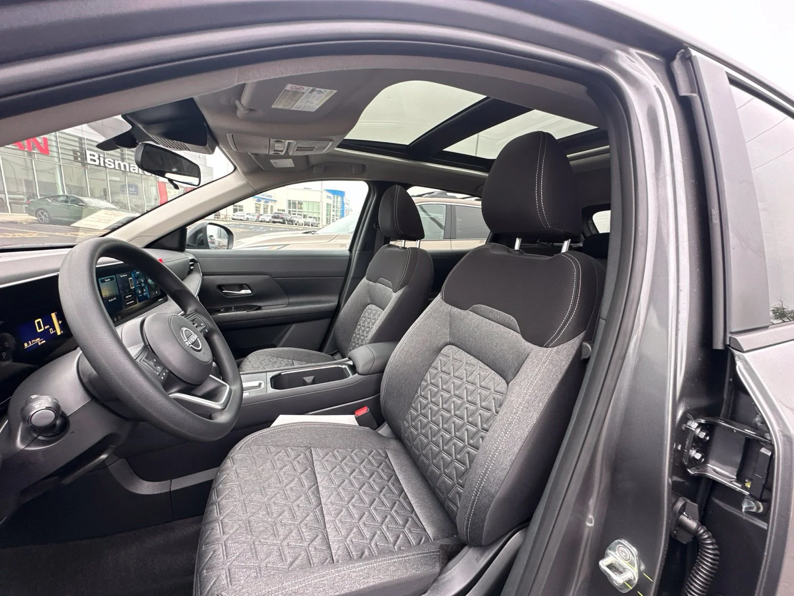 New 2027 Gun Metallic Nissan SV image 11