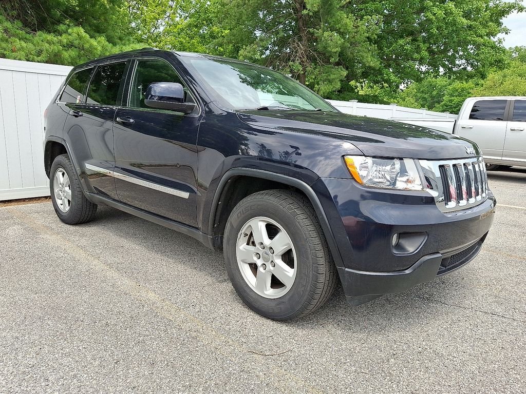 Used 2011 Black Jeep Laredo image 1