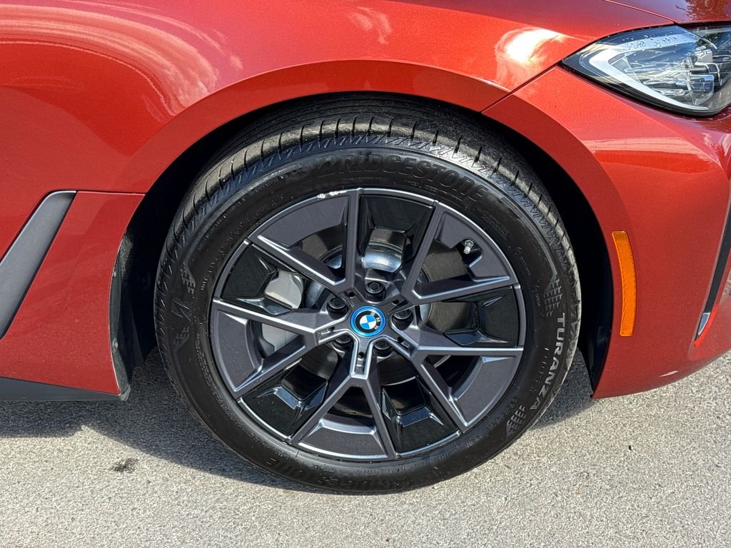 Certified Used 2023 Sunset Orange Metallic BMW eDrive35 image 7