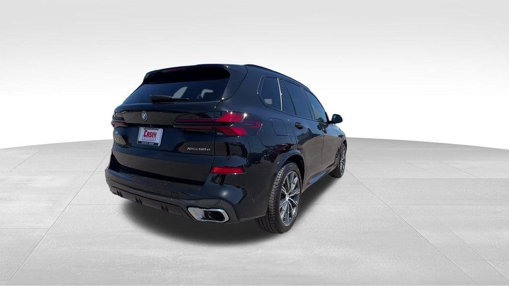 New 2026 Black Sapphire Metallic BMW xDrive50e image 12