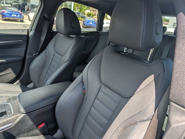 Certified Used 2023 Black Sapphire Metallic BMW eDrive40 image 14