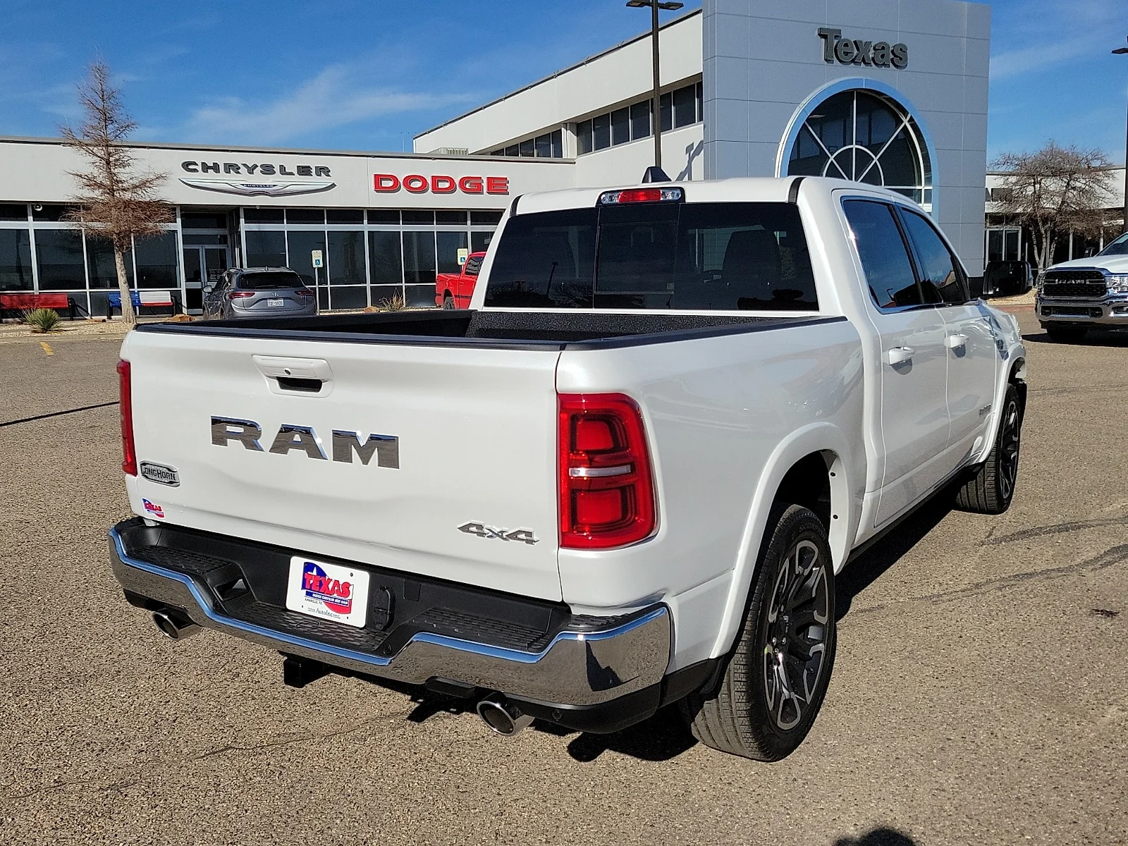 New 2026 Bright White Ram LIMITED LONGHORN CREW CAB 4X4 5