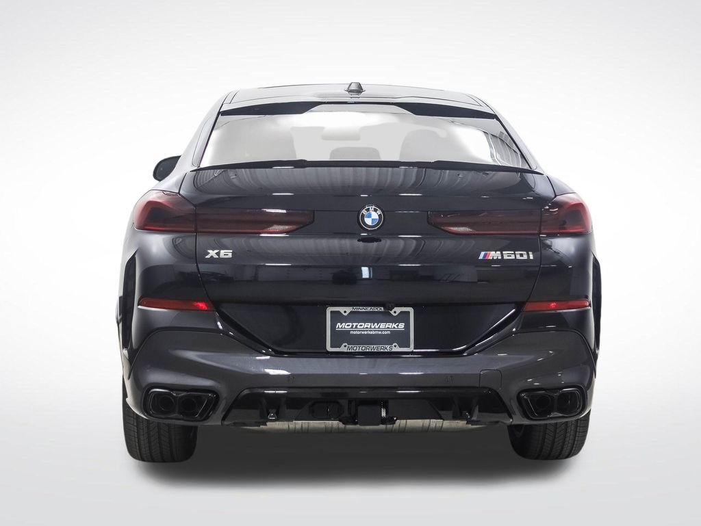 Used 2026 Black Sapphire Metallic BMW M60i image 4