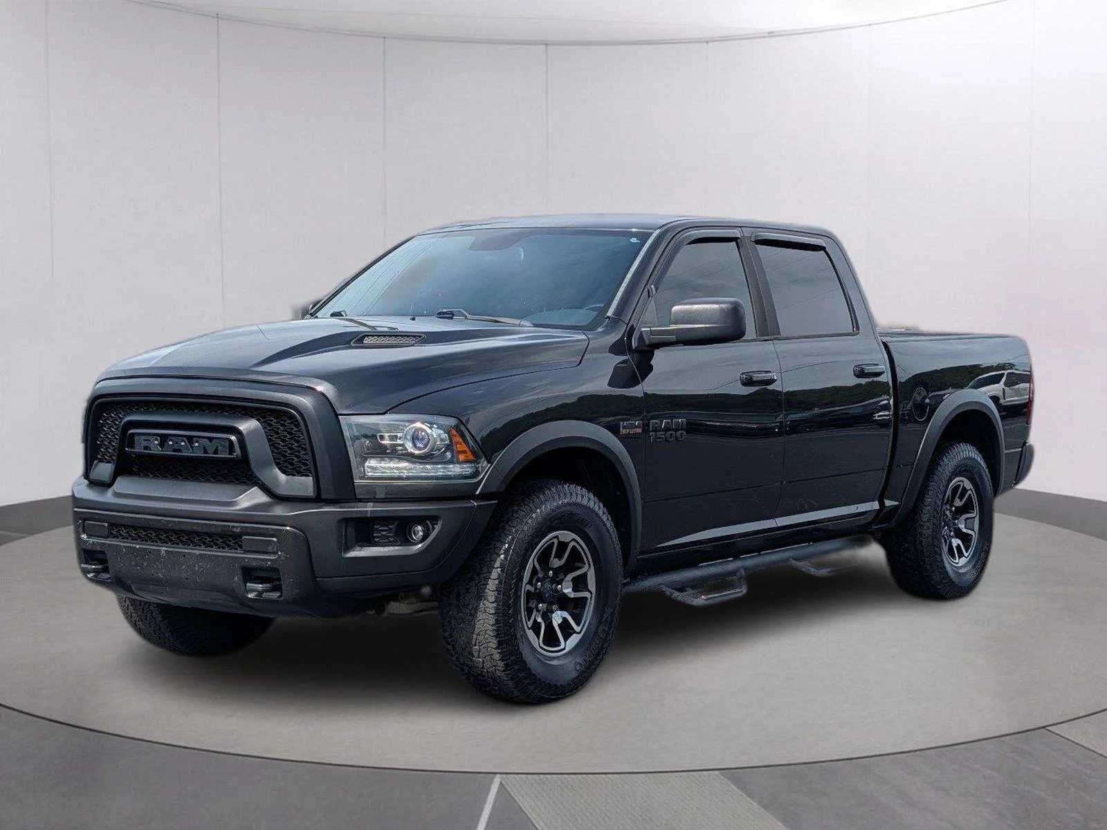 Used 2016 Brilliant Black Crystal Pearlcoat Ram Rebel image 1