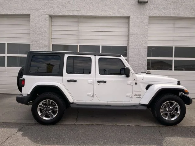 Used 2019 White Jeep Unlimited Sahara image 1