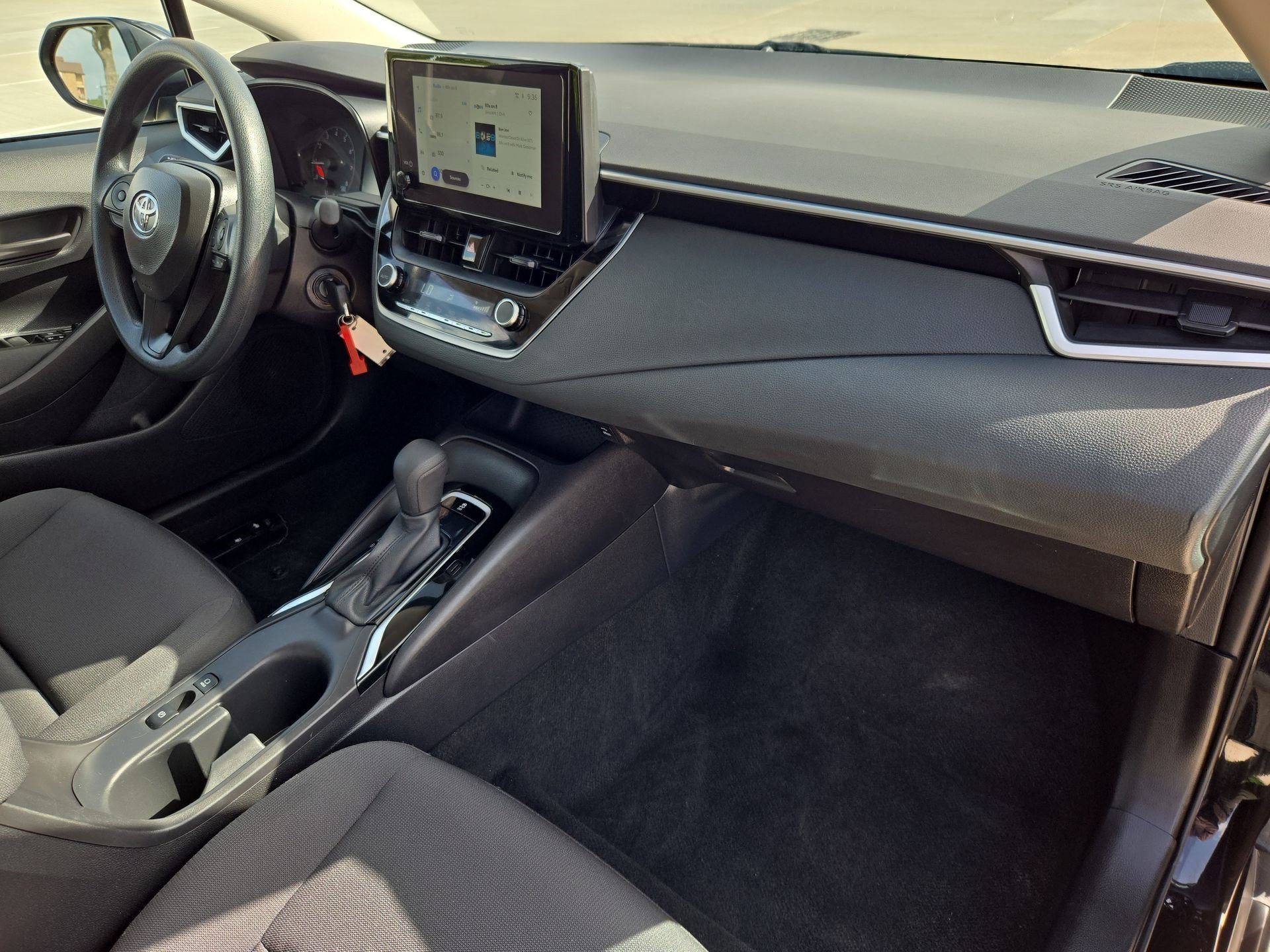 Used 2025 Midnight Black Metallic Toyota LE image 30