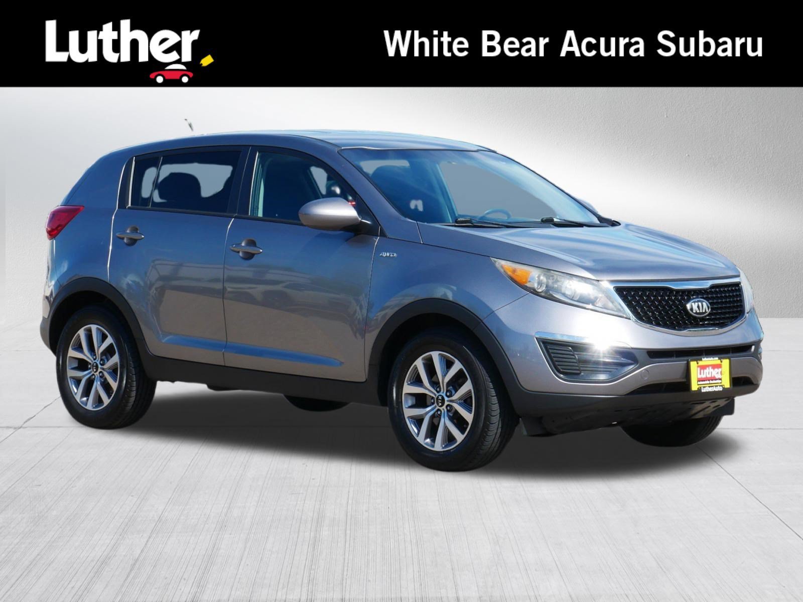 Used 2015 Mineral Silver Kia LX image 1