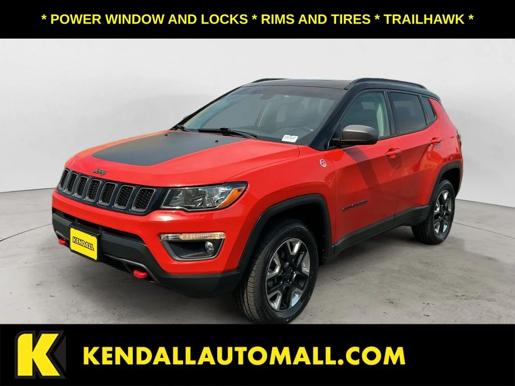 Used 2018 Orange Jeep Trailhawk image 1