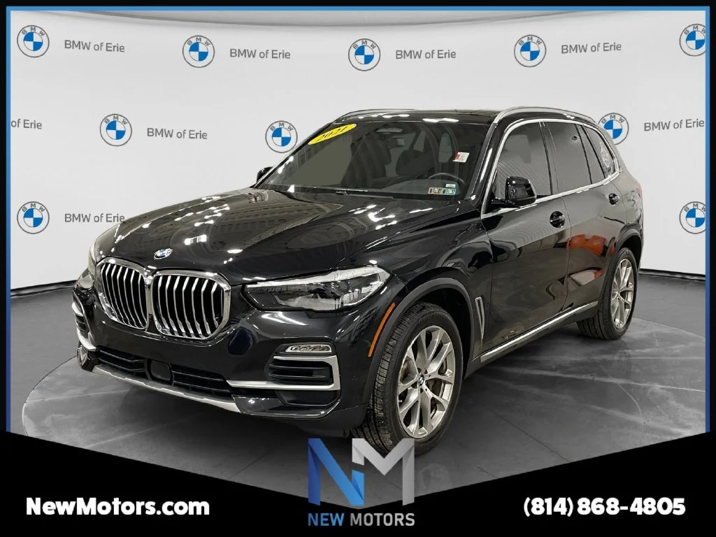 Used 2021 Black Sapphire Metallic BMW xDrive40i image 1
