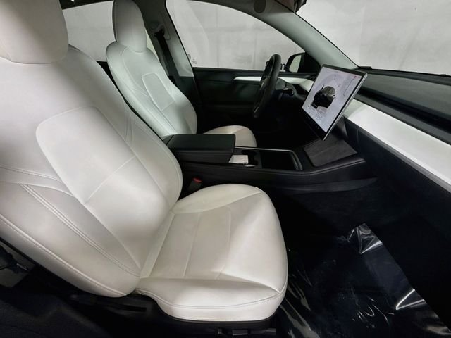 Used 2023 Solid Black Tesla Performance image 23