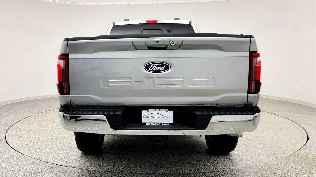 Used 2025 Iconic Silver Metallic Ford LARIAT 4WD SuperCrew 6.5
