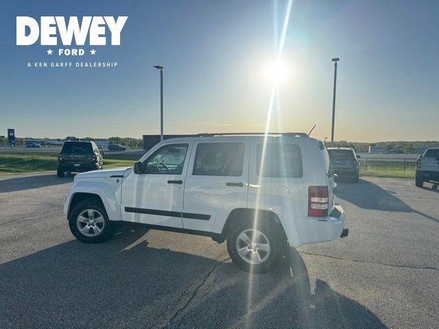 Used 2012 Bright White Jeep Sport image 8