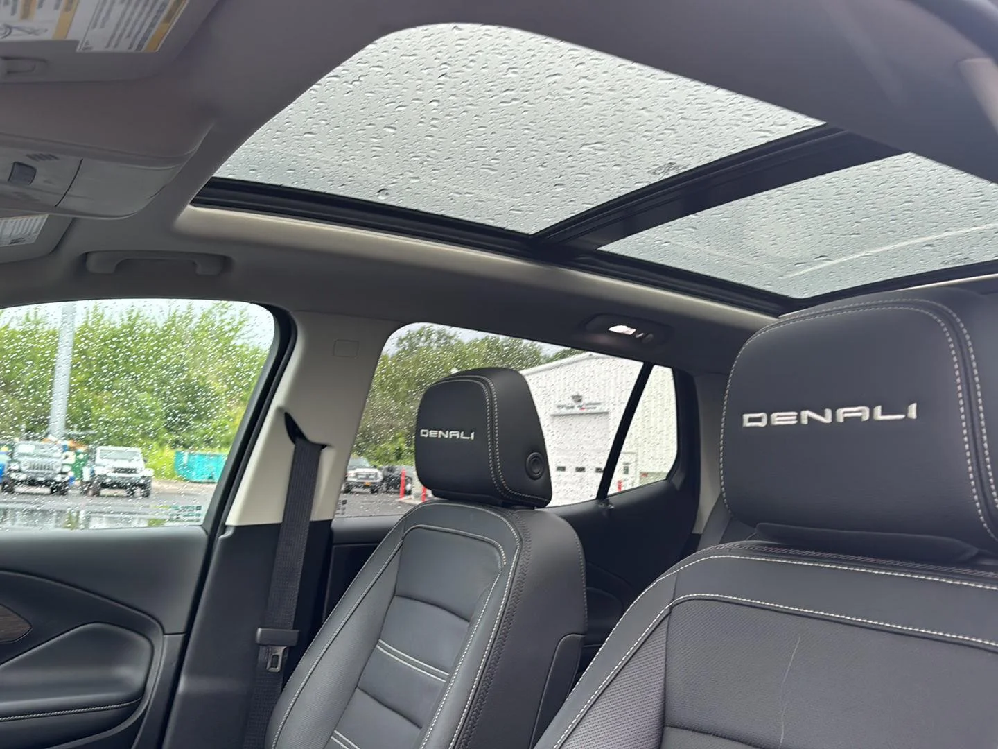Used 2024 Ebony Twilight Metallic GMC Denali image 2