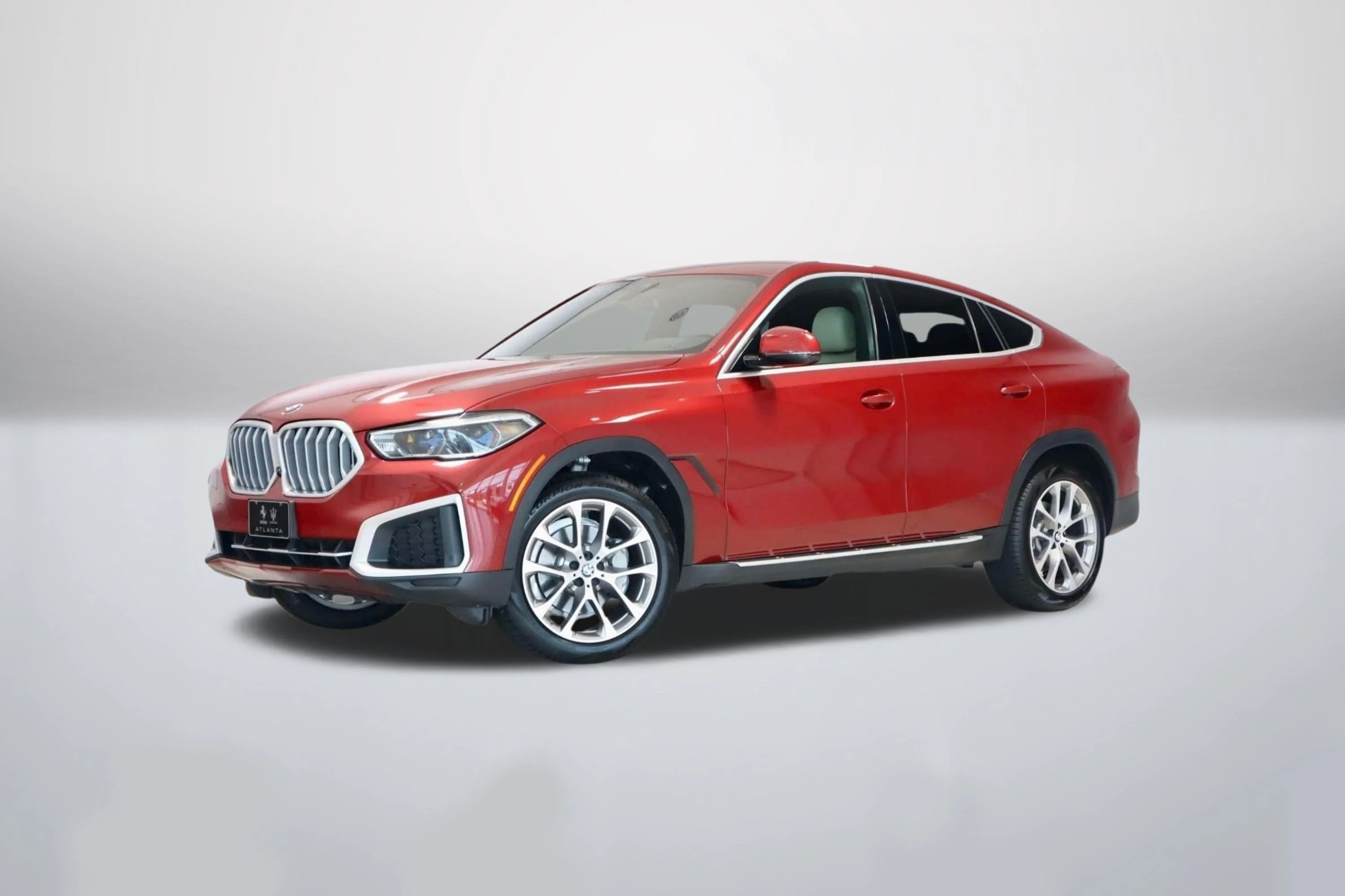 Used 2022 Flamenco Red Metallic BMW xDrive40i image 1